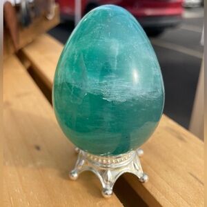 Beautiful polished green Flourite egg on stand